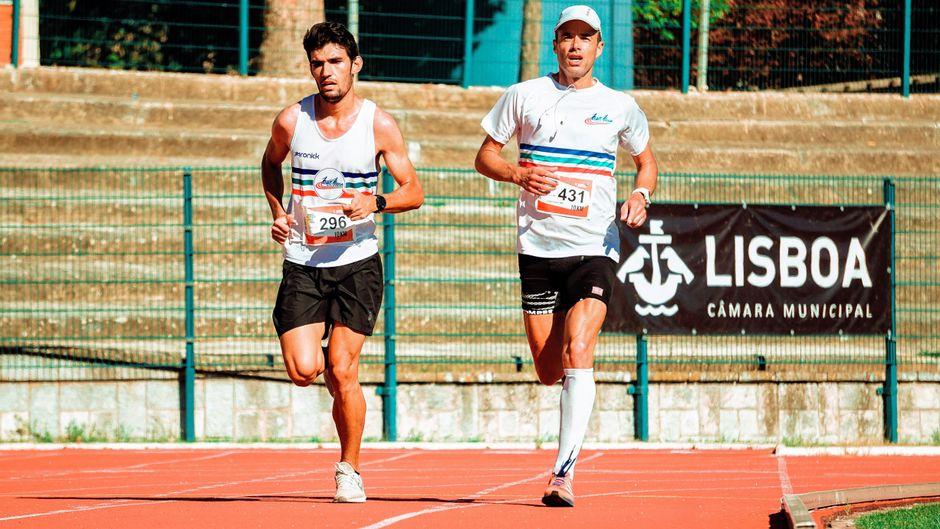 Two Men Running on Track